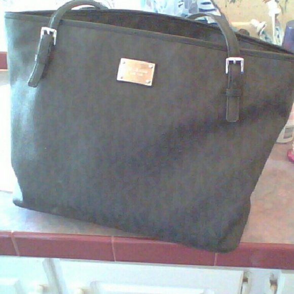 Michael Kors purse $400 or best offer