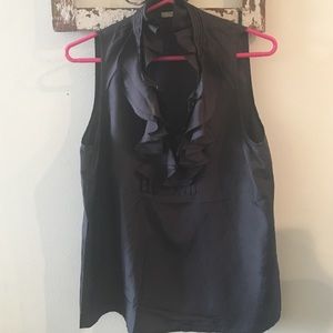 Great top! Ruffles at the top with buttons