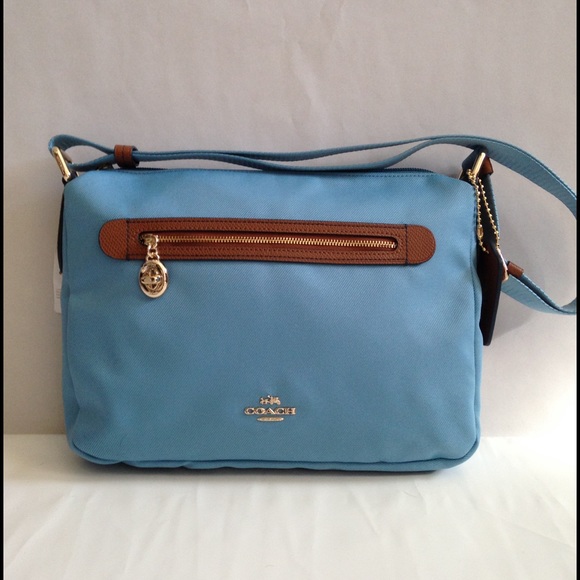 Coach Handbags - Coach light blue fabric messenger NWT