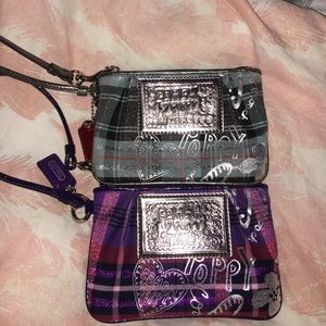 Two coach wristlets.