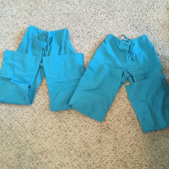 Two small scrub pants