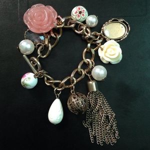 Pink and gold charm bracelet