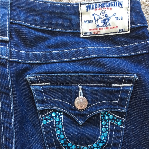 True Religion jeans with turquoise rhinestones. 28