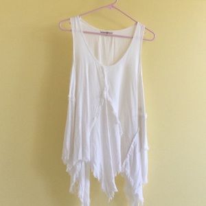 White ragged-edged flowy top