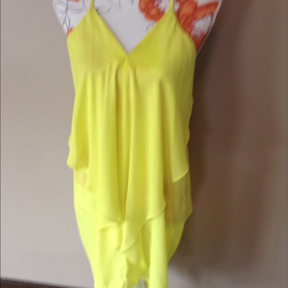 Bright yellow chiffon dress.