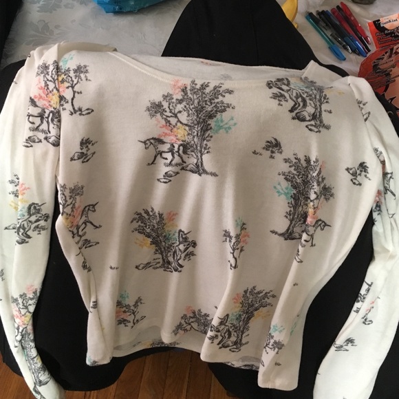 White long sleeve shirt with unicorn/tree design
