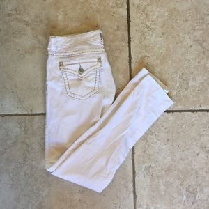 Solid white miss me skinny jeans