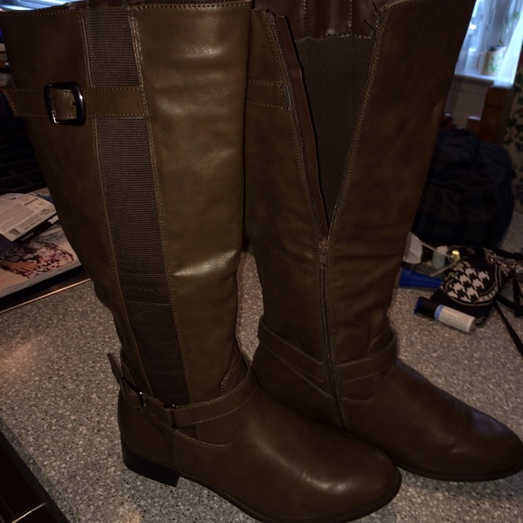 Brown riding boots.