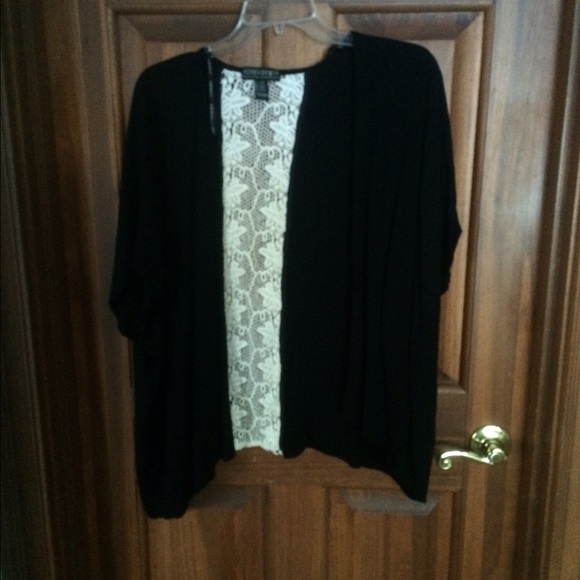 Black cardigan with creme crochet on the back