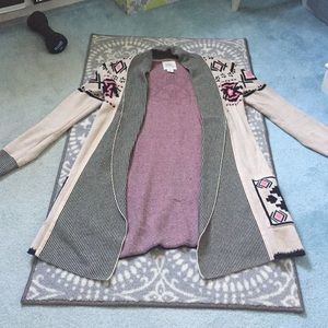 Pink, black, and tan tribal printed cardigan.