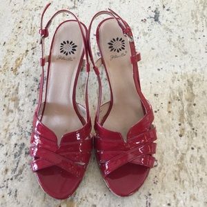 Yellow Box red patent cork heels