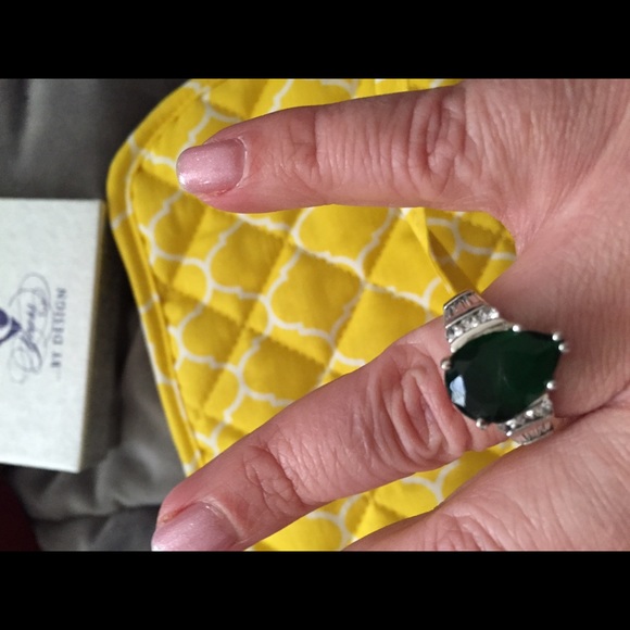 Size 8 ring. Green stone. Do not know origin.