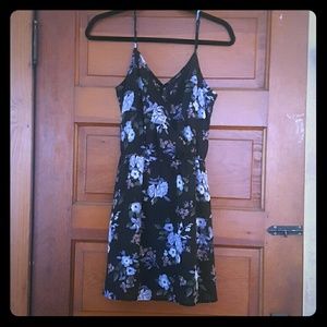 Floral, lined black dress.