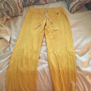 Yellow sweats. Pink brand