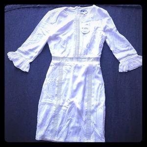 Classy white cocktail dress