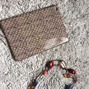 Snakeskin print Coach iPad mini case