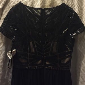 Formaldress worn once has tags and tailored slip