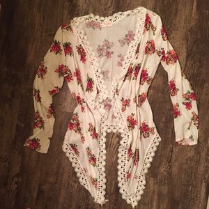 Floral and lace hi-lo over blouse.