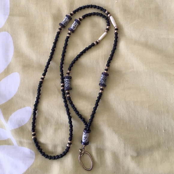 Necklace eye glasses holder