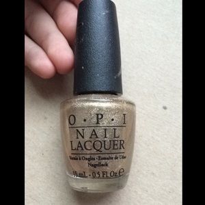 O•P•I nail lacquer.  Gold.