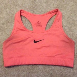 Bright pink nike sports bra
