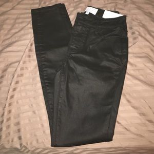 Black faux leather ripped knee jeans