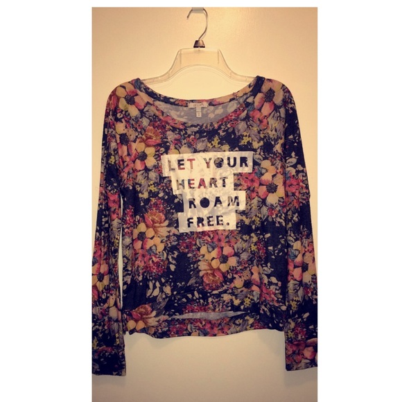 Delia's medium shirt "Let your heart roam free."