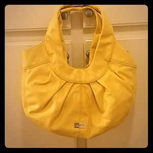 Nine Co yellow purse