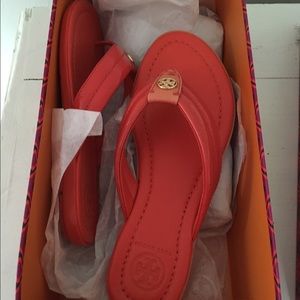 Tory Burch leather flip flops.