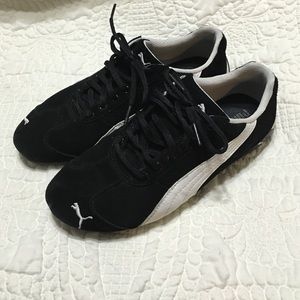 Black and white puma shoes