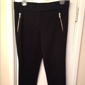 Forever 21 black skinny pants with gold accents