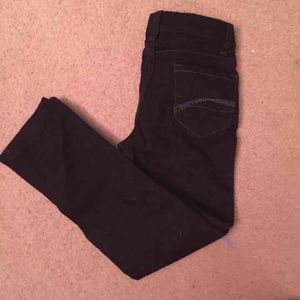 Girl's black skinny jeans