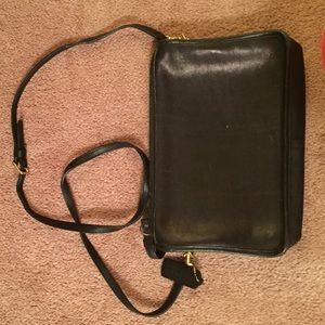 Coach Black leather zippered coach cross body bag.