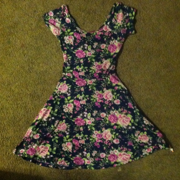 An opened back floral pink and purple dress 💞