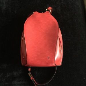 Exclusive vintage Louis Vuitton RED Epi leather.