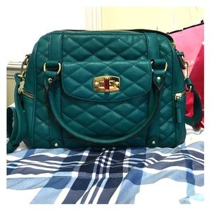Teal aqua colored purse