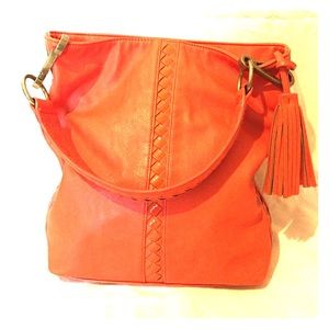 Carlos Santana orange leather purse