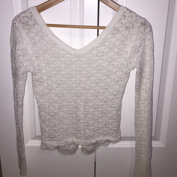 White patterned long sleeve pull over shirt