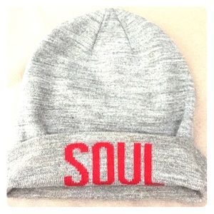 grey beanie with red lettering