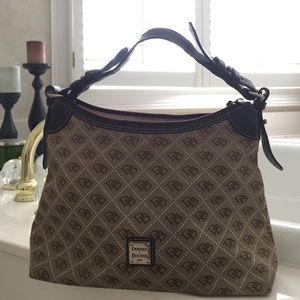 Just reduced Dooney and Burke canvas shoulder bag