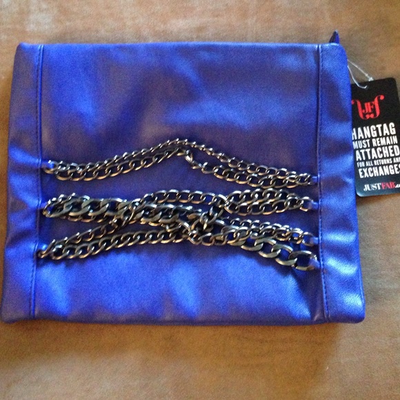 RESERVED blue oversized clutch with chains NWT. 💙