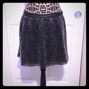 Sassy sequin skirt with leather detail