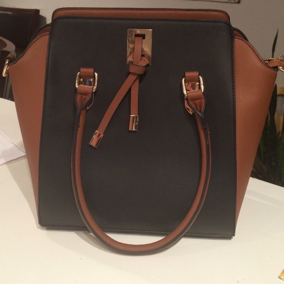 Beautiful brown and black bag with red interior