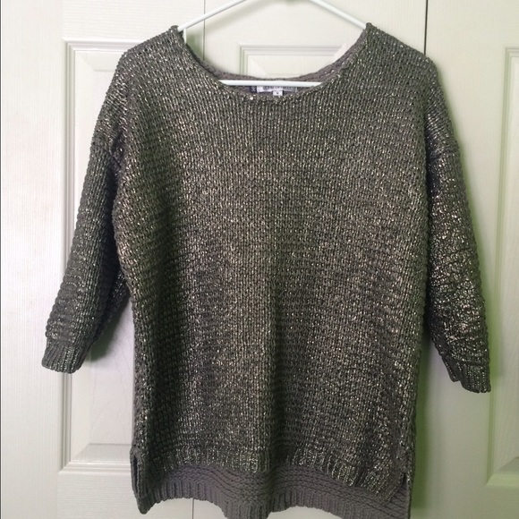 Medium metallic sweater made by Jennifer Lopez