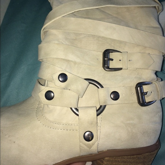Cream colored boots from The Buckle