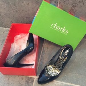 Black leather and patent pumps