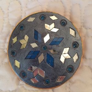 Pocket mirror with gold accents