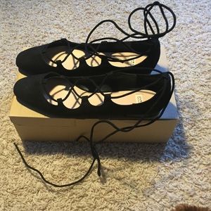 Black ballerina flats