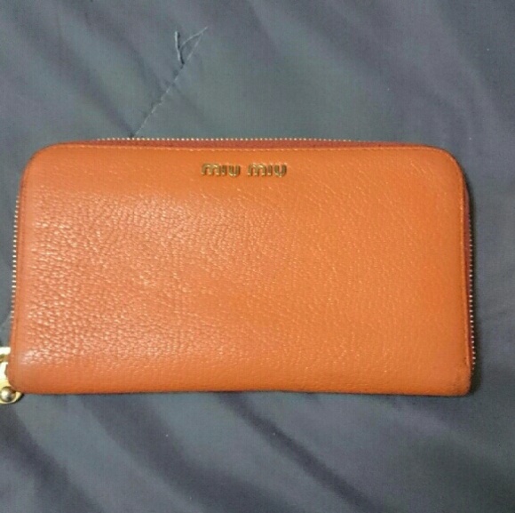 Authentic Miu Miu orange Madras Zip around Wallet