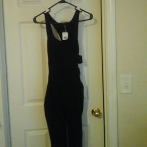 Black open back bodysuit, never worn